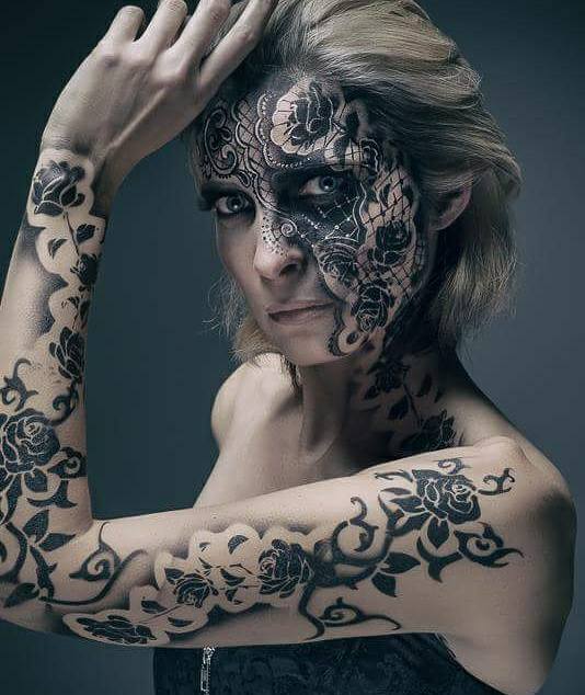Photoshoot airbrush body tattoo, makeup. Body art. Studio makeup, airbrush face paint