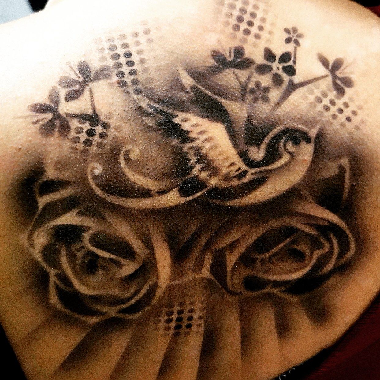 Airbrush temporary tattoos for the pool party