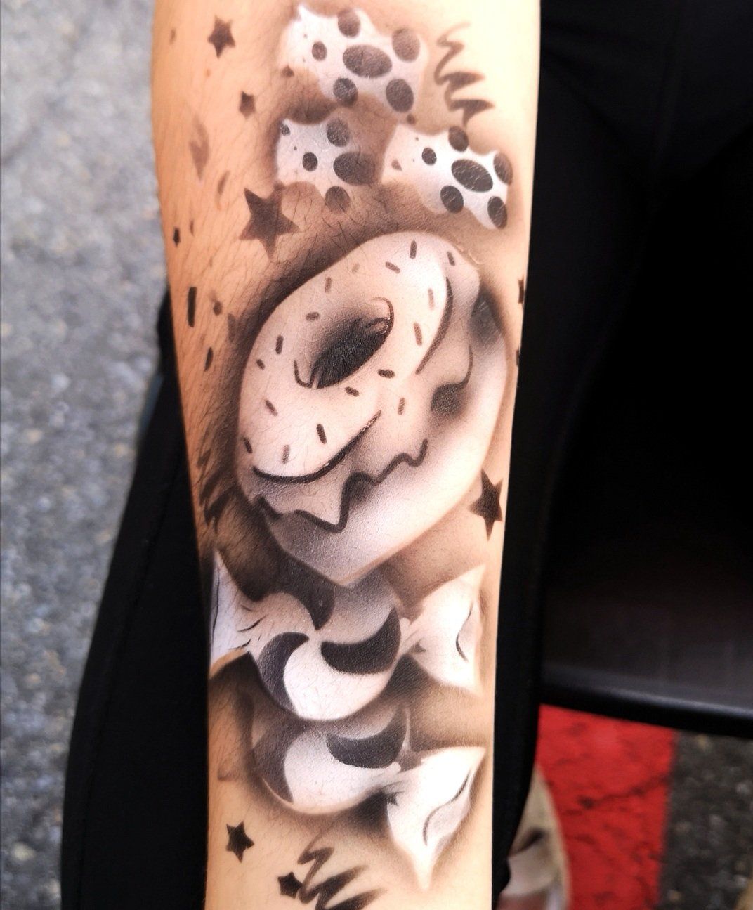 Airbrush temporary tattoo for school event