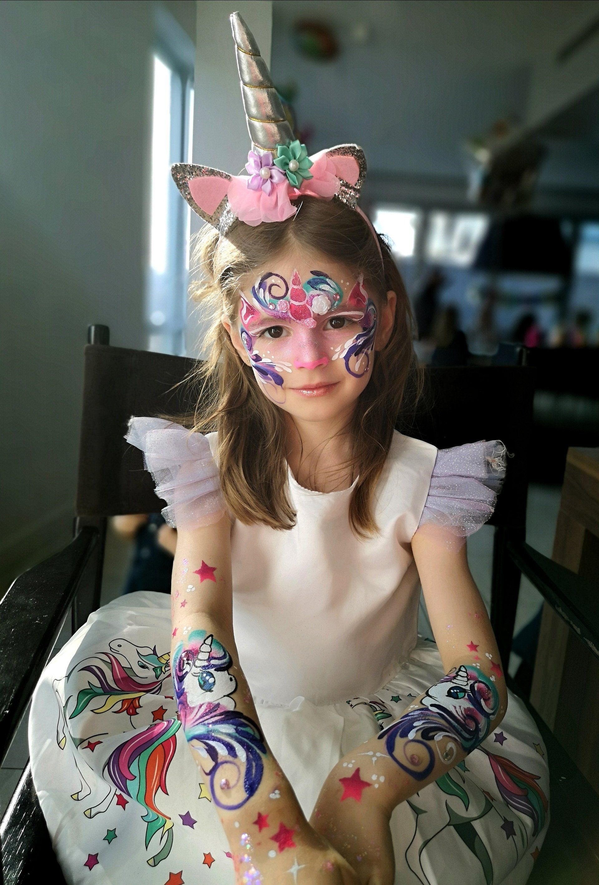 Unicorn face paint. Birthday party for kids