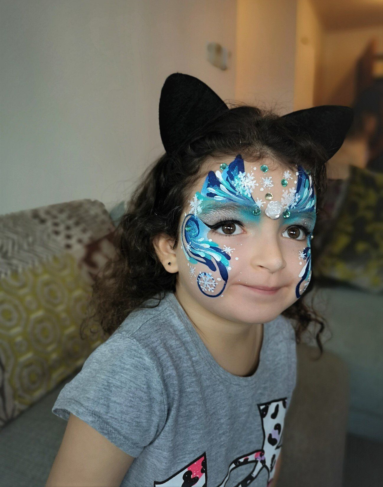 Winter face painting designs. Snow fairy snowflakes