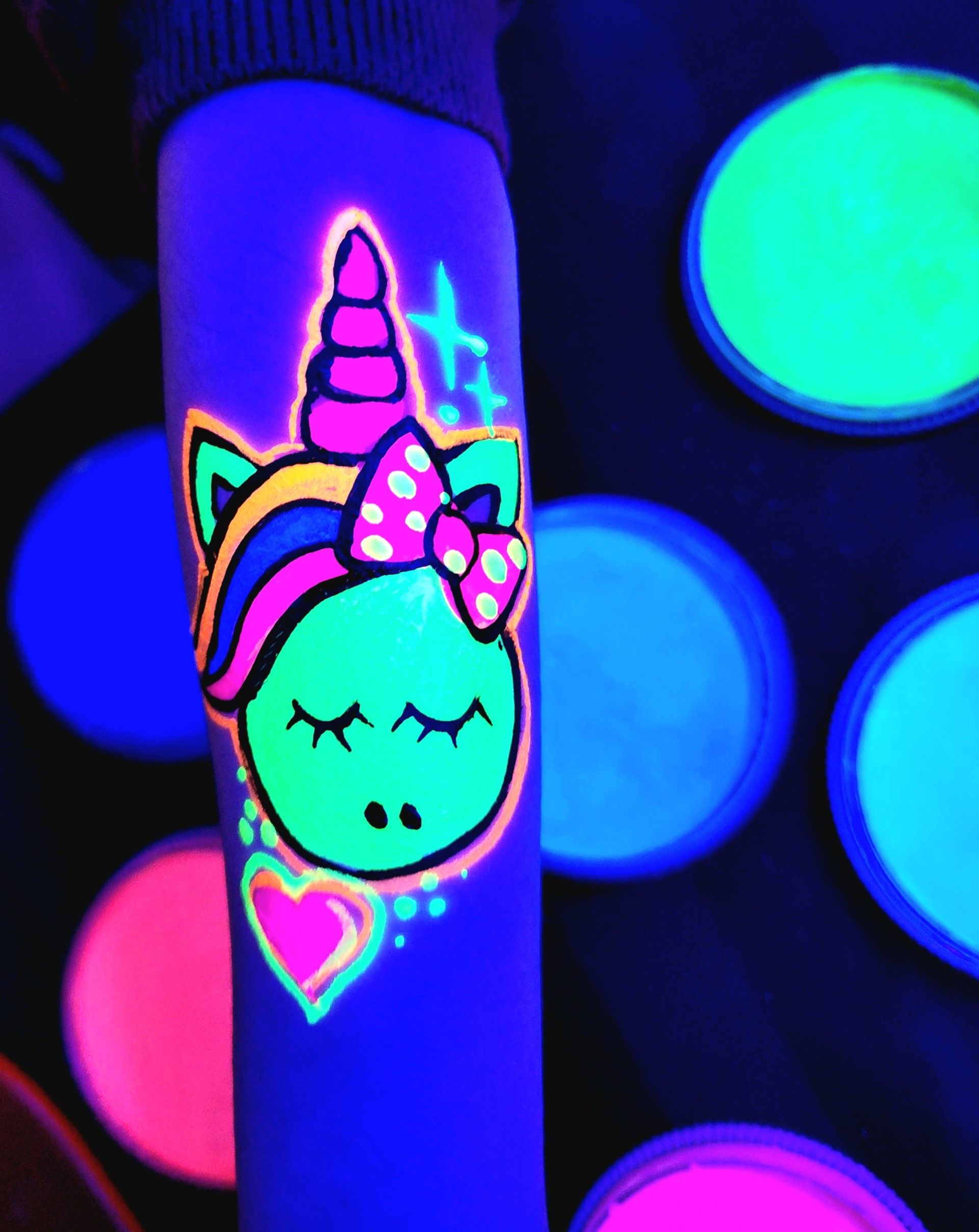 Glow in the dark party for kids. Unicorn desigh