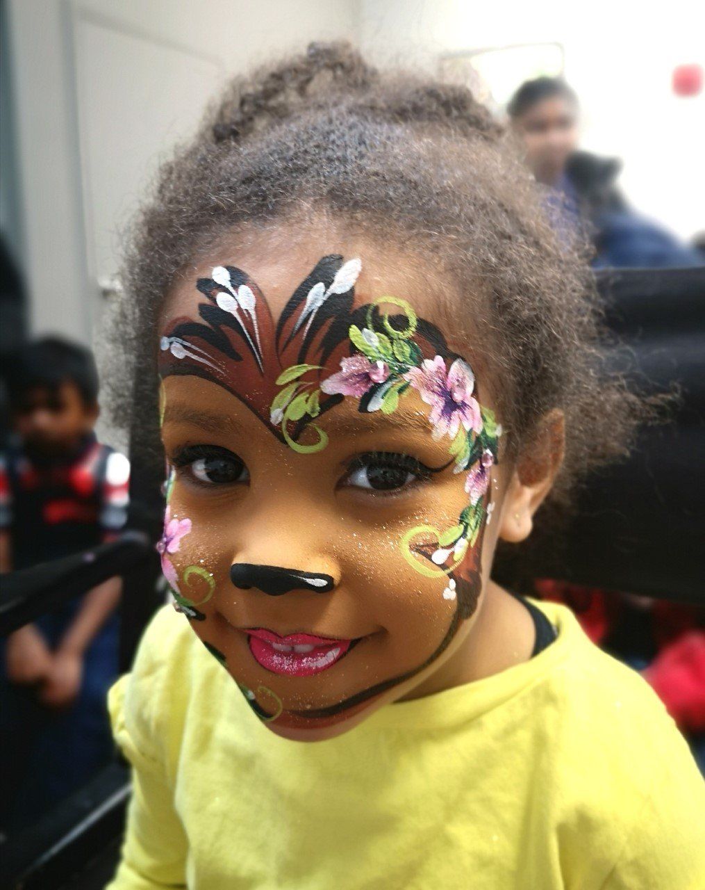 Monkey face paint design. Day care event