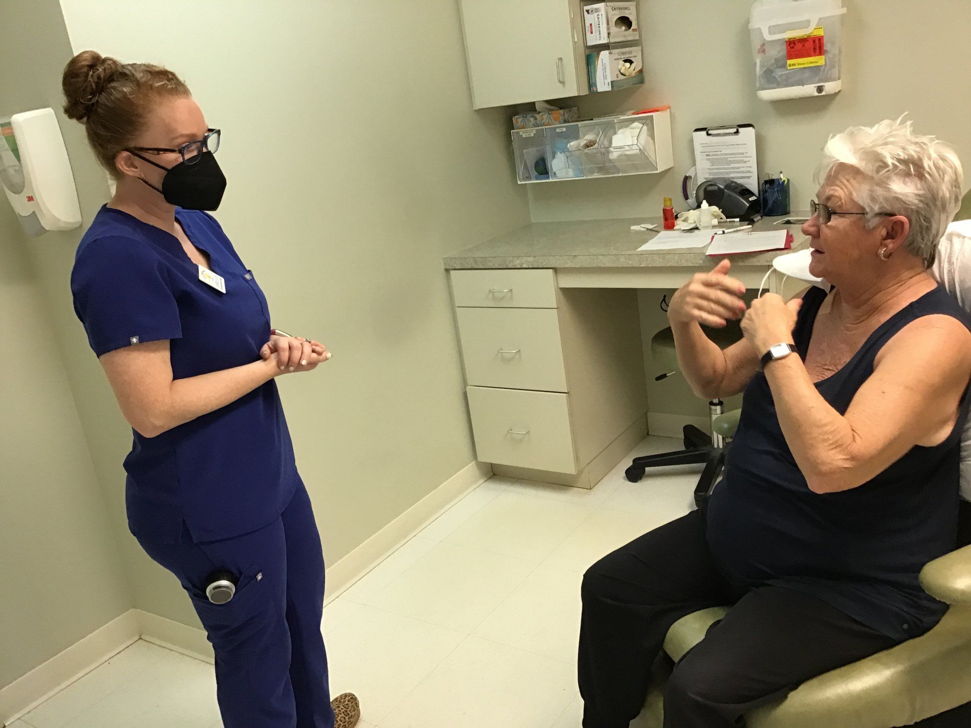 Skin Cancer of Florida - Nurse speaking to patient