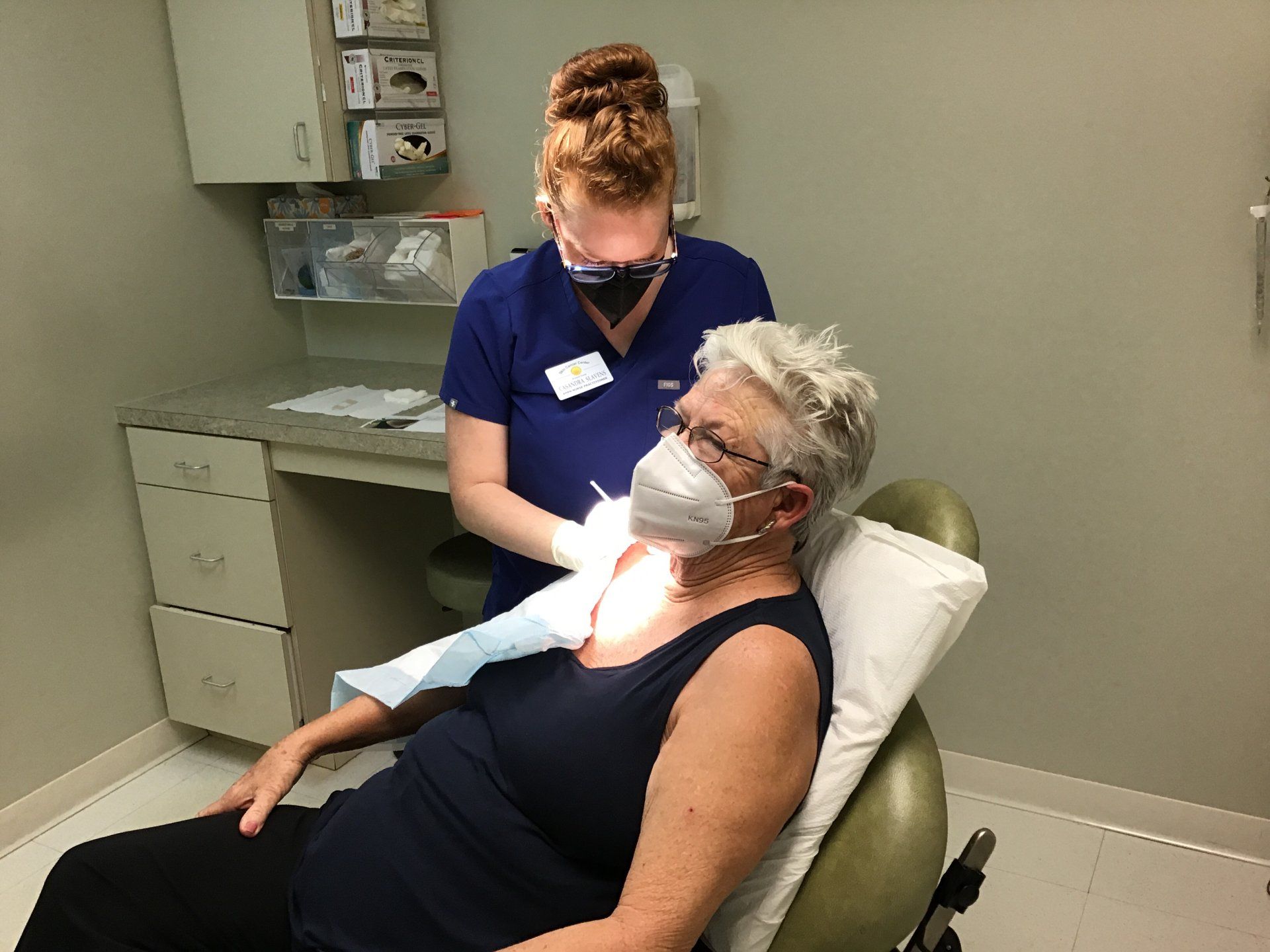 Doctor working on patient - skin surgery