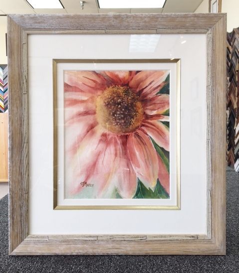 Framed art piece of flower
