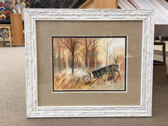 Framed art piece of cannon