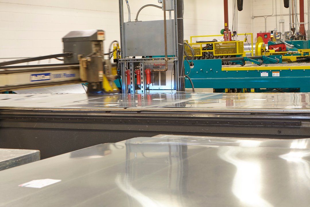 Creating Metal Plate ─ Milwaukee, WI ─ Kotze Construction Co., Inc.