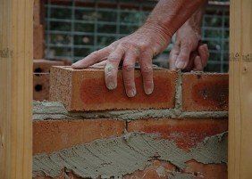 Laying Bricks - Brick Veneer
