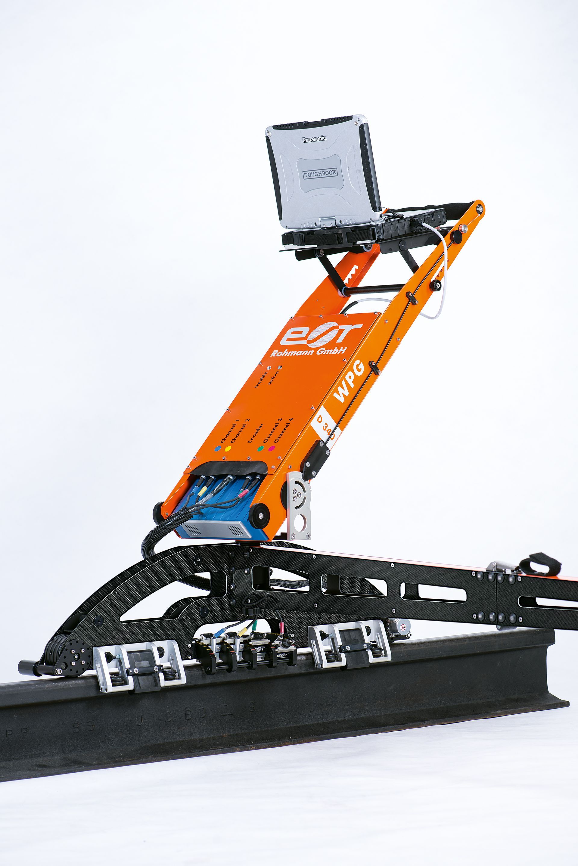 A robot with a laptop on top of it.