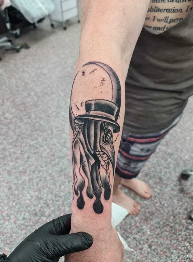 Beak Mask Arm Tattoo - Tattoo Studio in Kawana, QLD