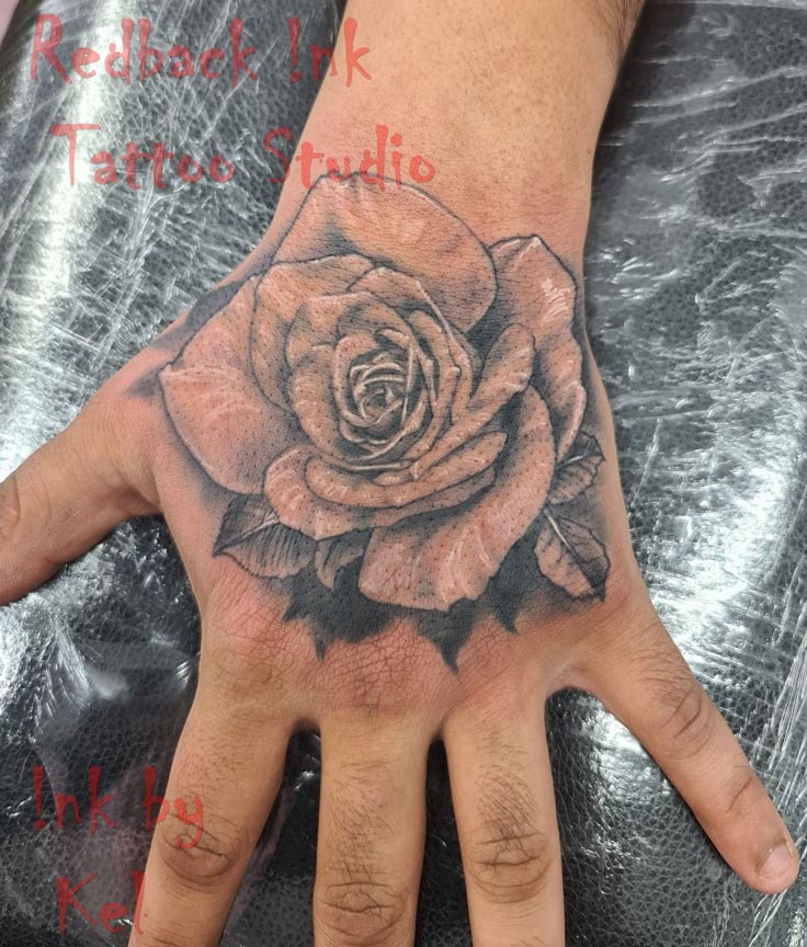 Redback Ink Hand Flower Tattoo - Tattoo Studio in Kawana, QLD