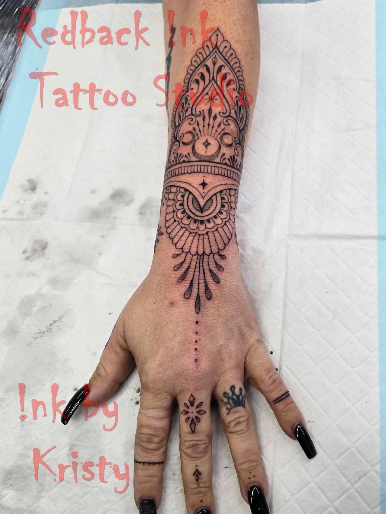 Wrist tattoo - Redback Ink Tattoo Studio in Kawana, QLD