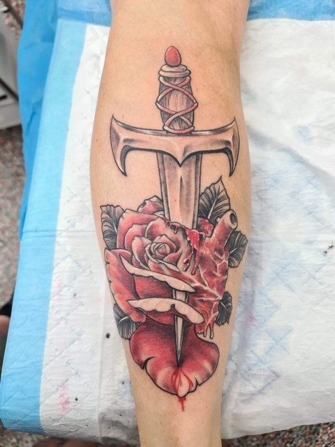 Dagger Stabbing Red Flower Tattoo - Tattoo Studio in Kawana, QLD