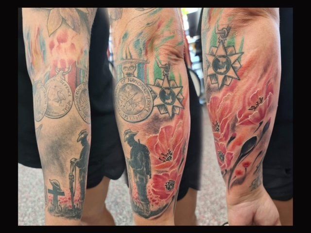 Medal and Flower Fire Tattoo - Tattoo Studio in Kawana, QLD