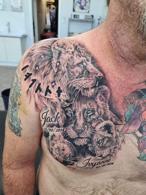Lion with Cubs on Chest Black and White Tattoo - Tattoo Studio in Kawana, QLD