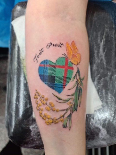 Small Yellow Butterfly on Checkered Heart Tattoo - Tattoo Studio in Kawana, QLD