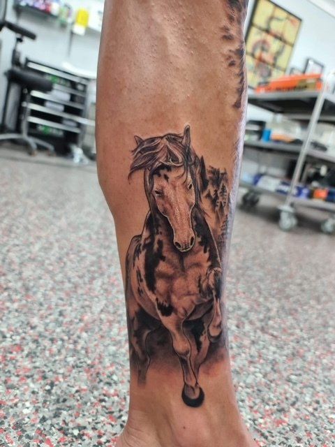 Running Horse Tattoo on Leg - Tattoo Studio in Kawana, QLD