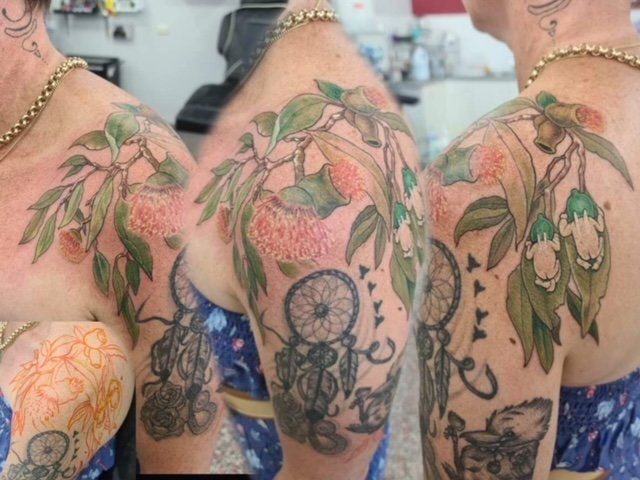 Colourful Flower Tattoo on  Ladies Arm - Tattoo Studio in Kawana, QLD