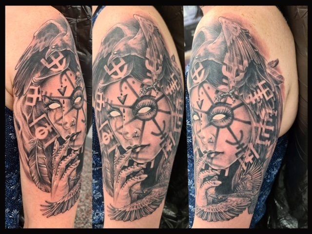 Woman with Crows Arm Tattoo - Tattoo Studio in Kawana, QLD