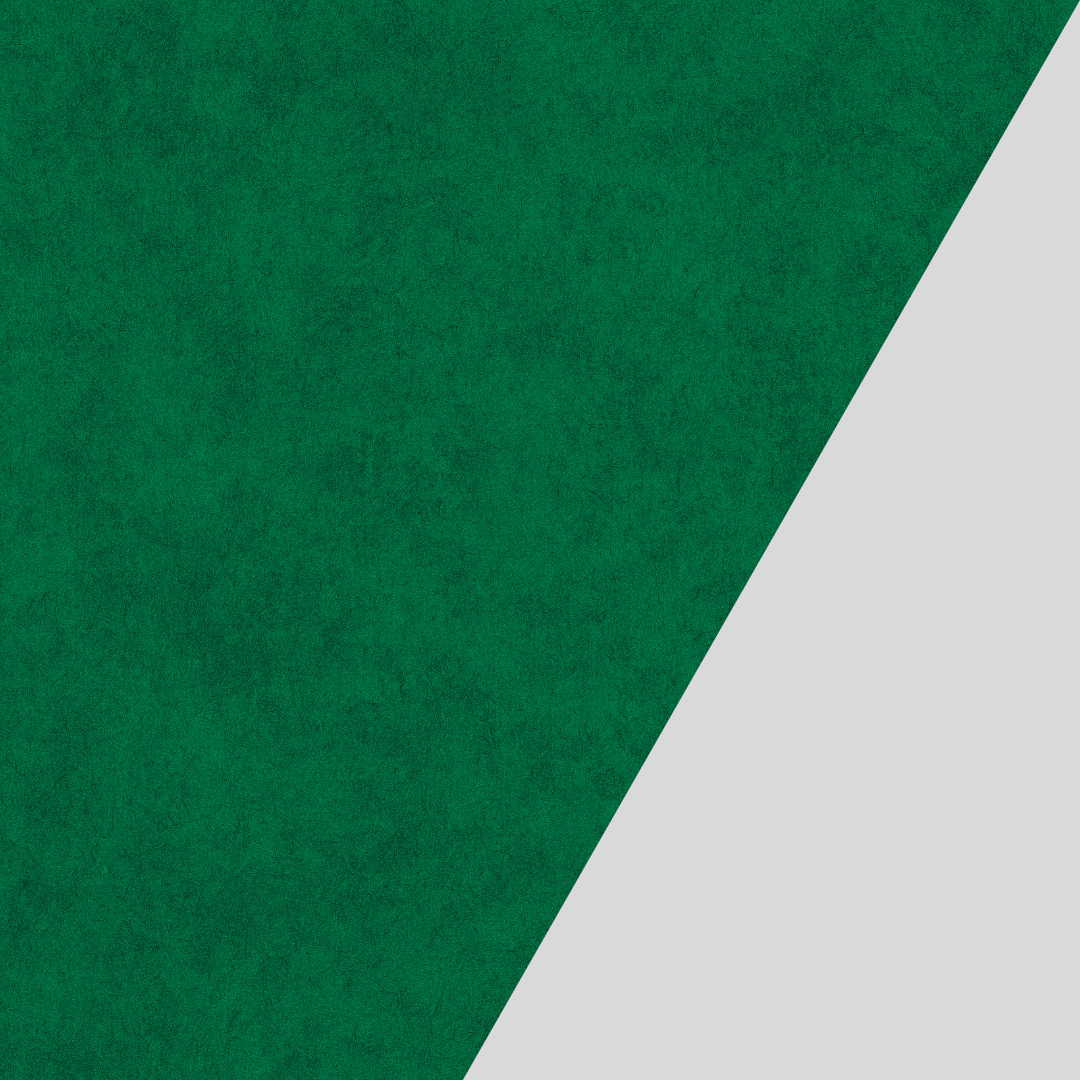 A close up of a green triangle on a white background