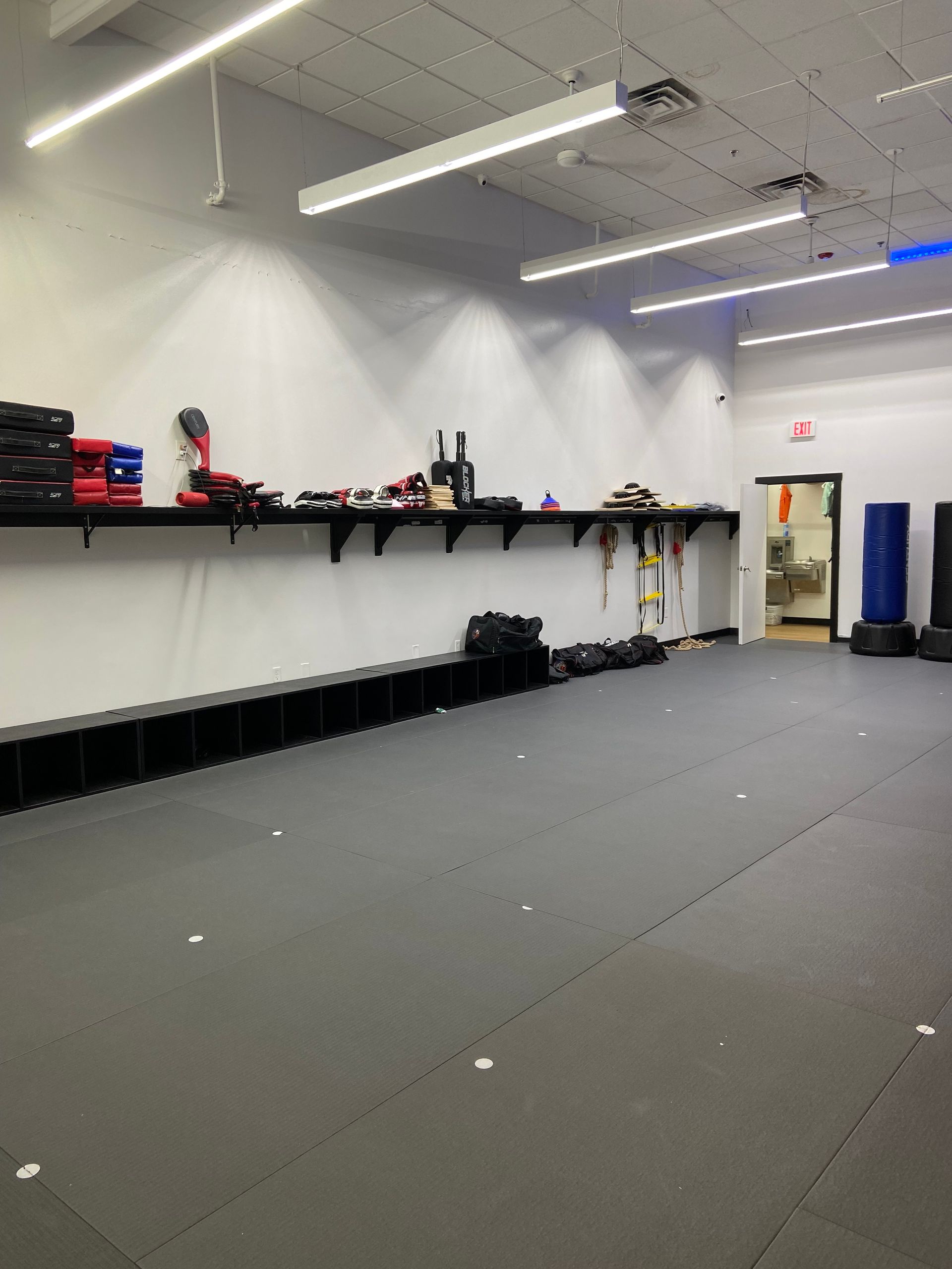 After: Floating Shelves in Training Area