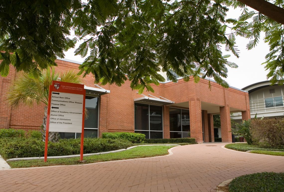 A brick building with a sign that says ' campus ' on it