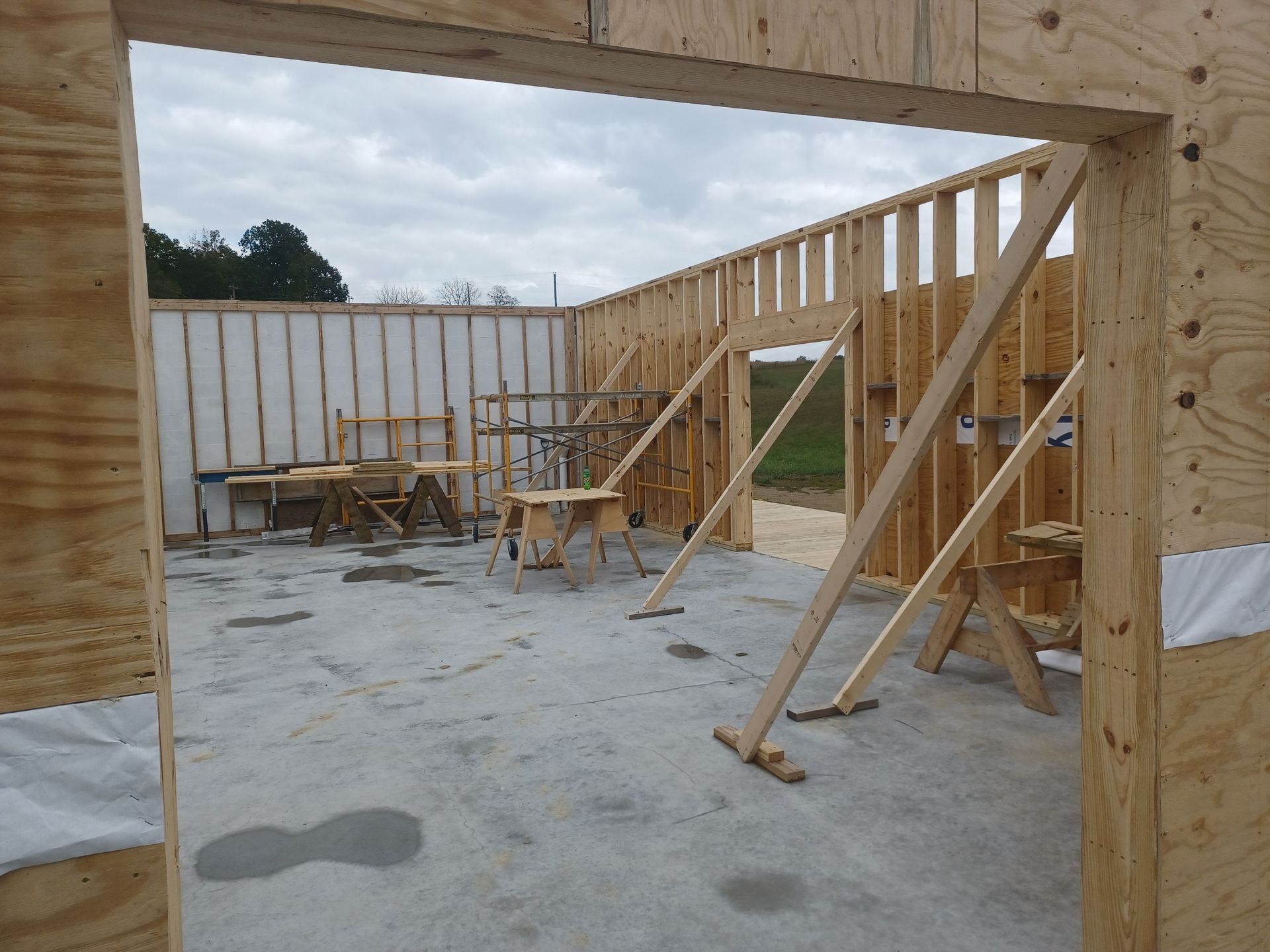 A wooden frame of a building under construction
