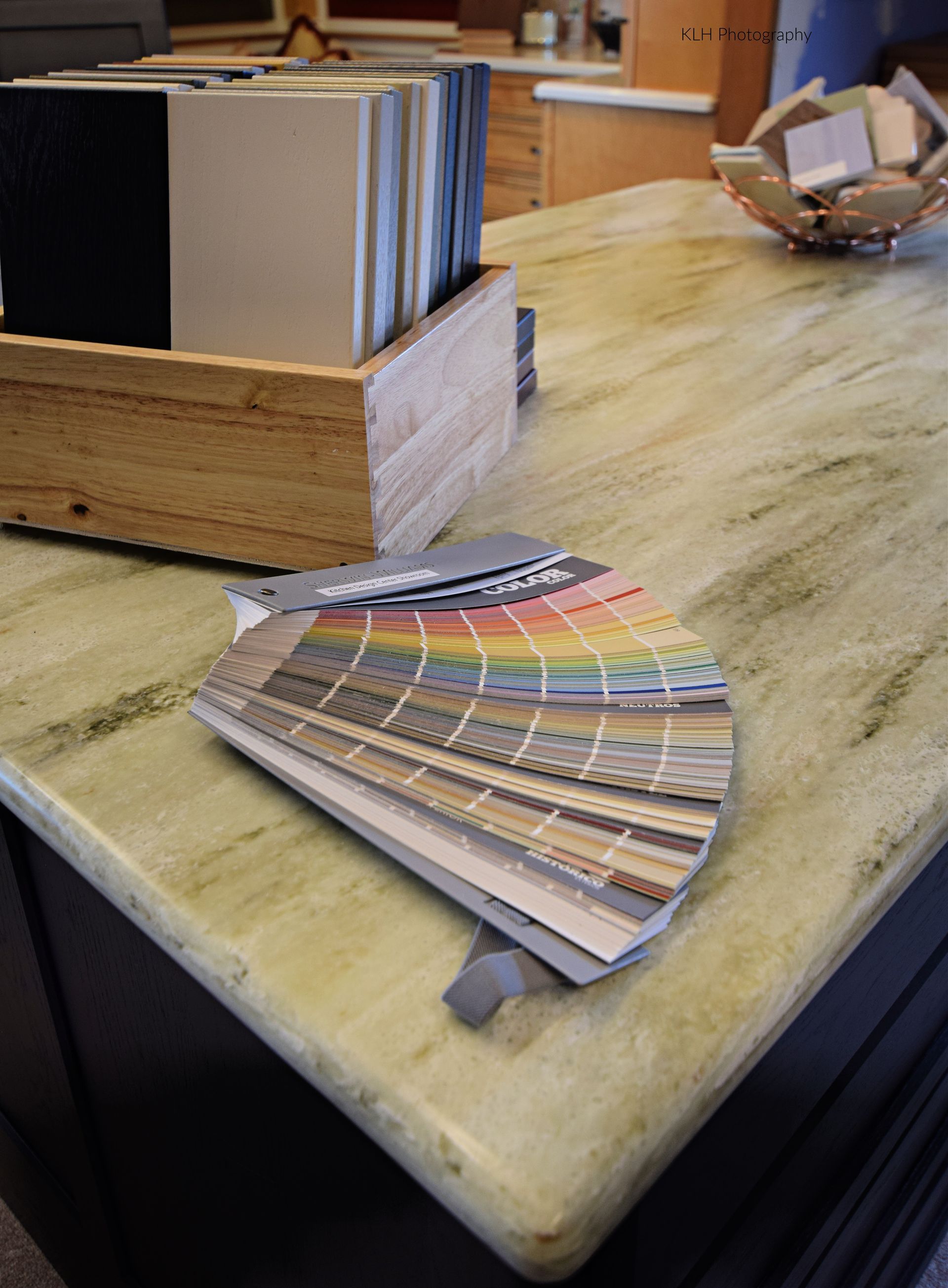 A bunch of color samples are on a table
