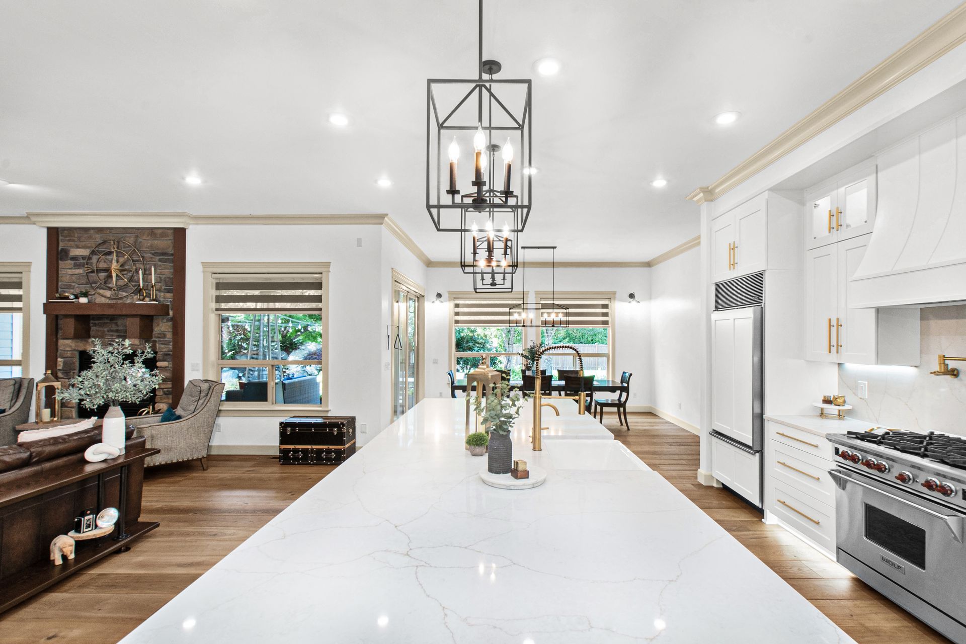 A kitchen with a large island in the middle of the room.