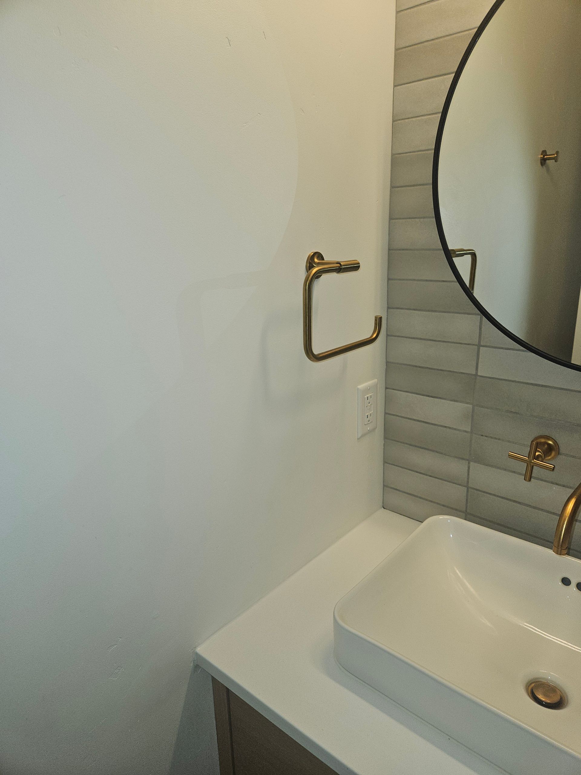 A person is using a drill to drill a hole in a piece of wood.