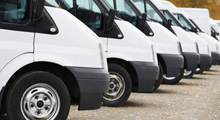 A row of white vans