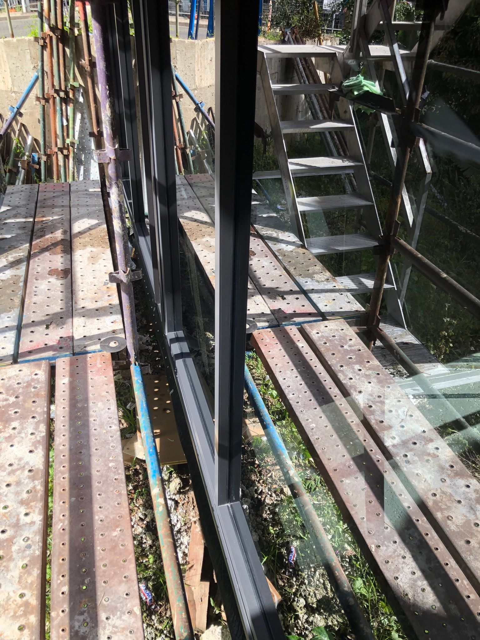 A staircase is being built on a wooden scaffolding.