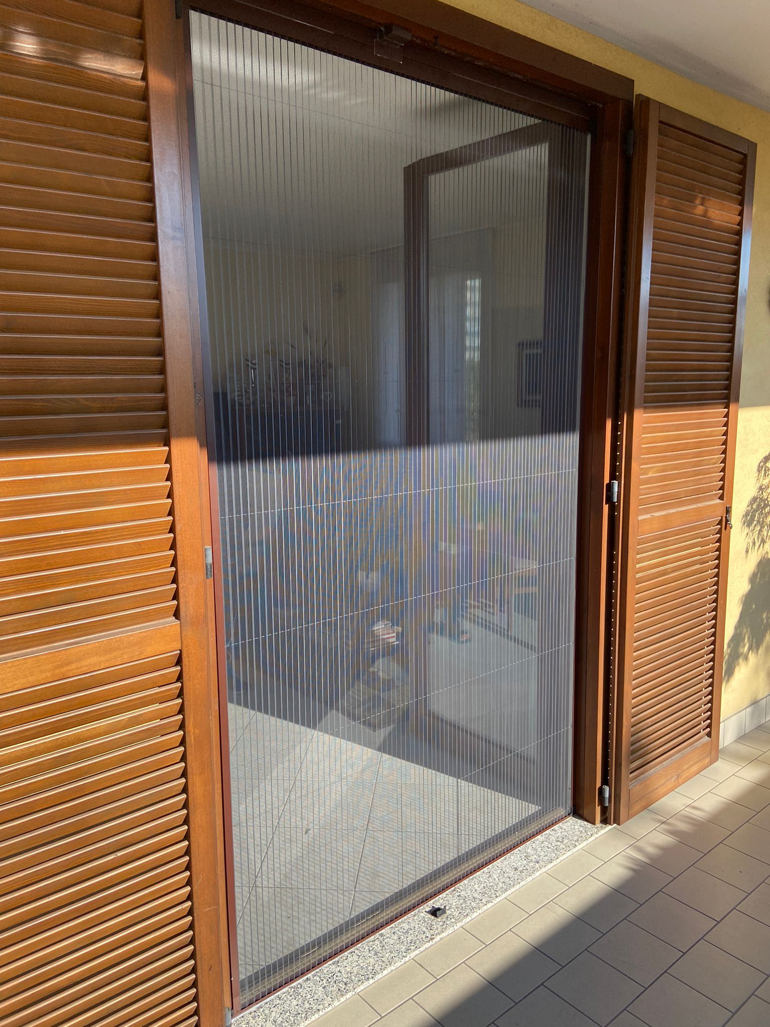 Zanzariere plissè portefinestre