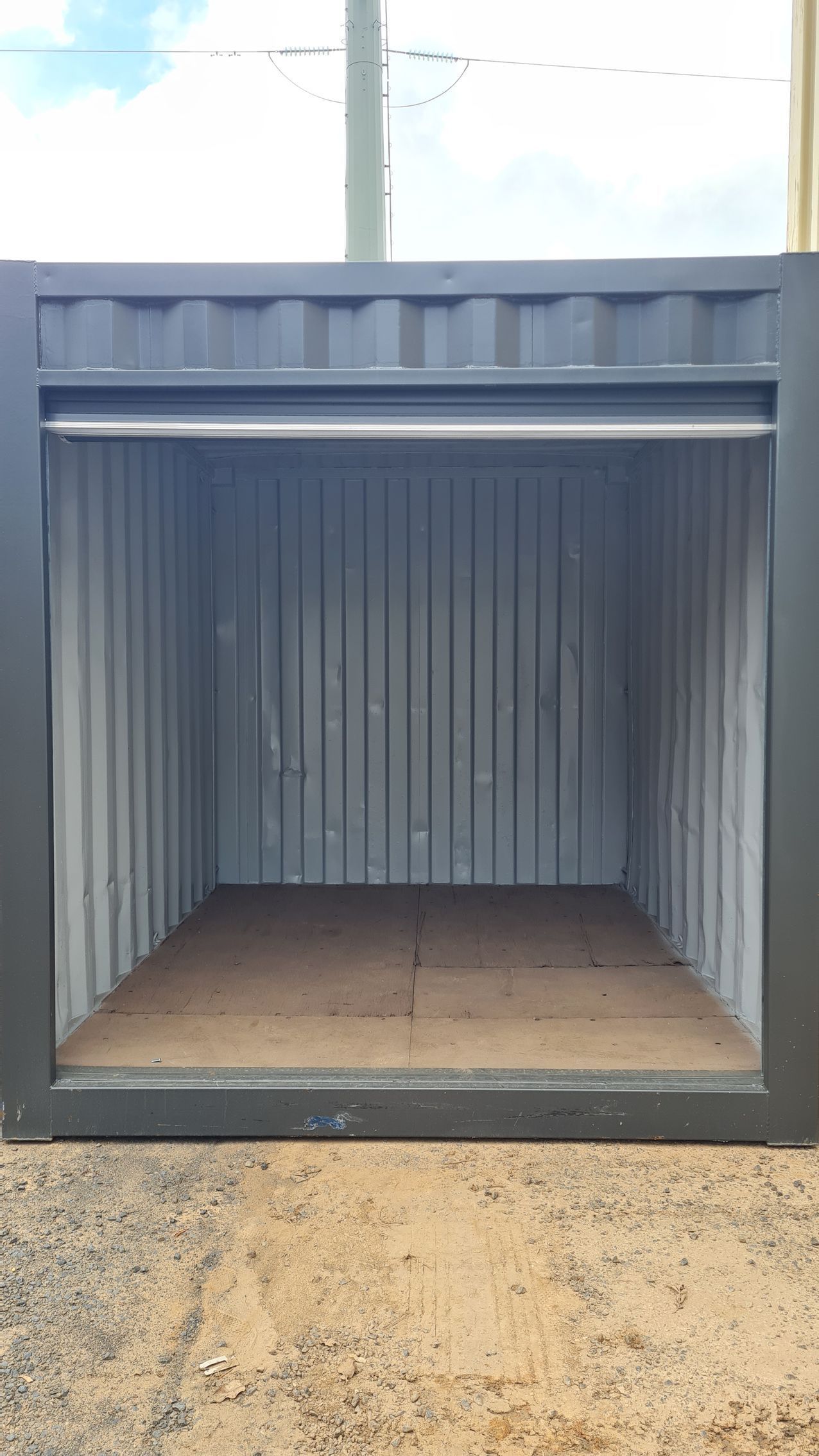 A Dark Gray Storage Container — East Coast Containers Shipping Containers and Transport in Chevallum, QLD