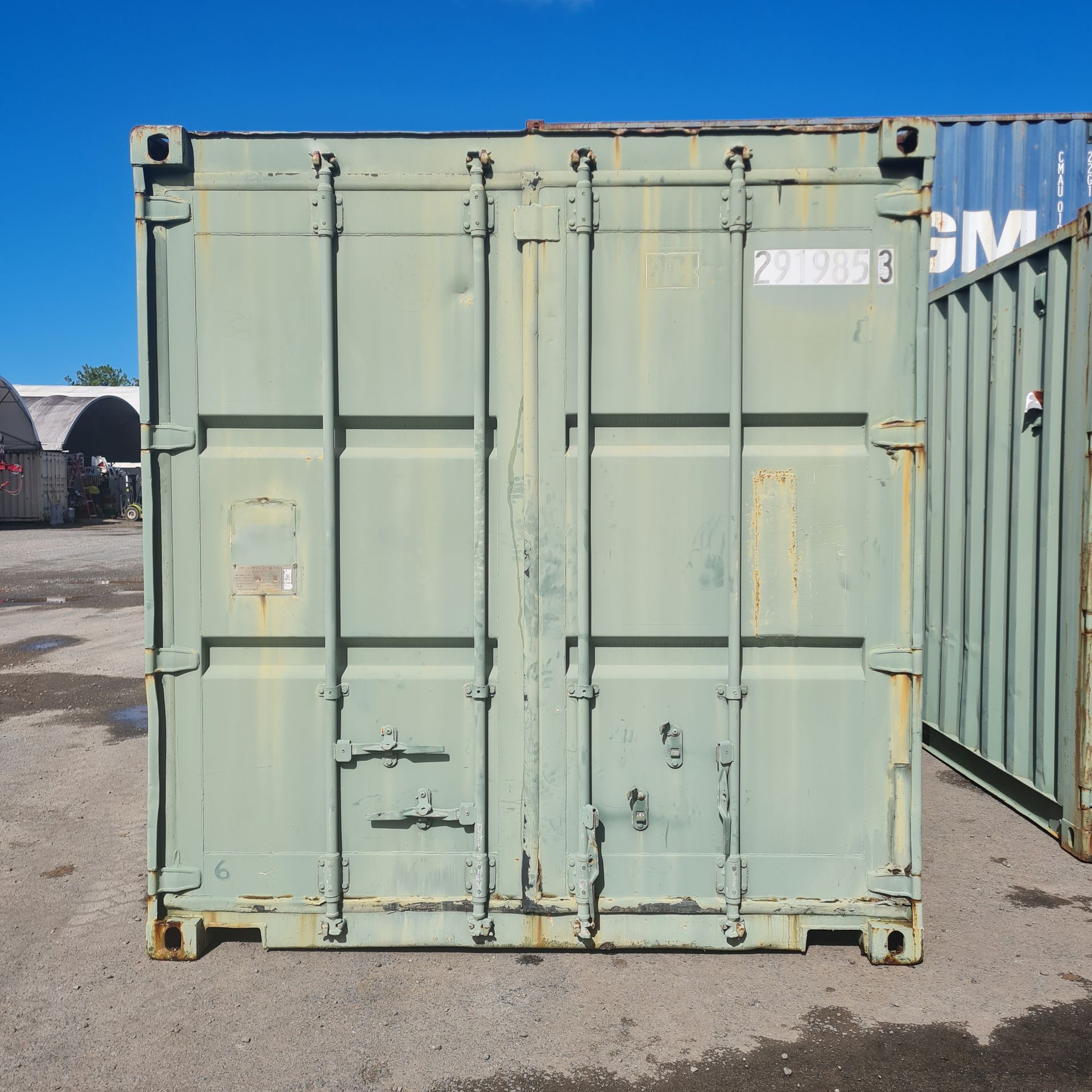 Green Shipping Container With Closed Doors — East Coast Containers Shipping Containers and Transport in Chevallum, QLD