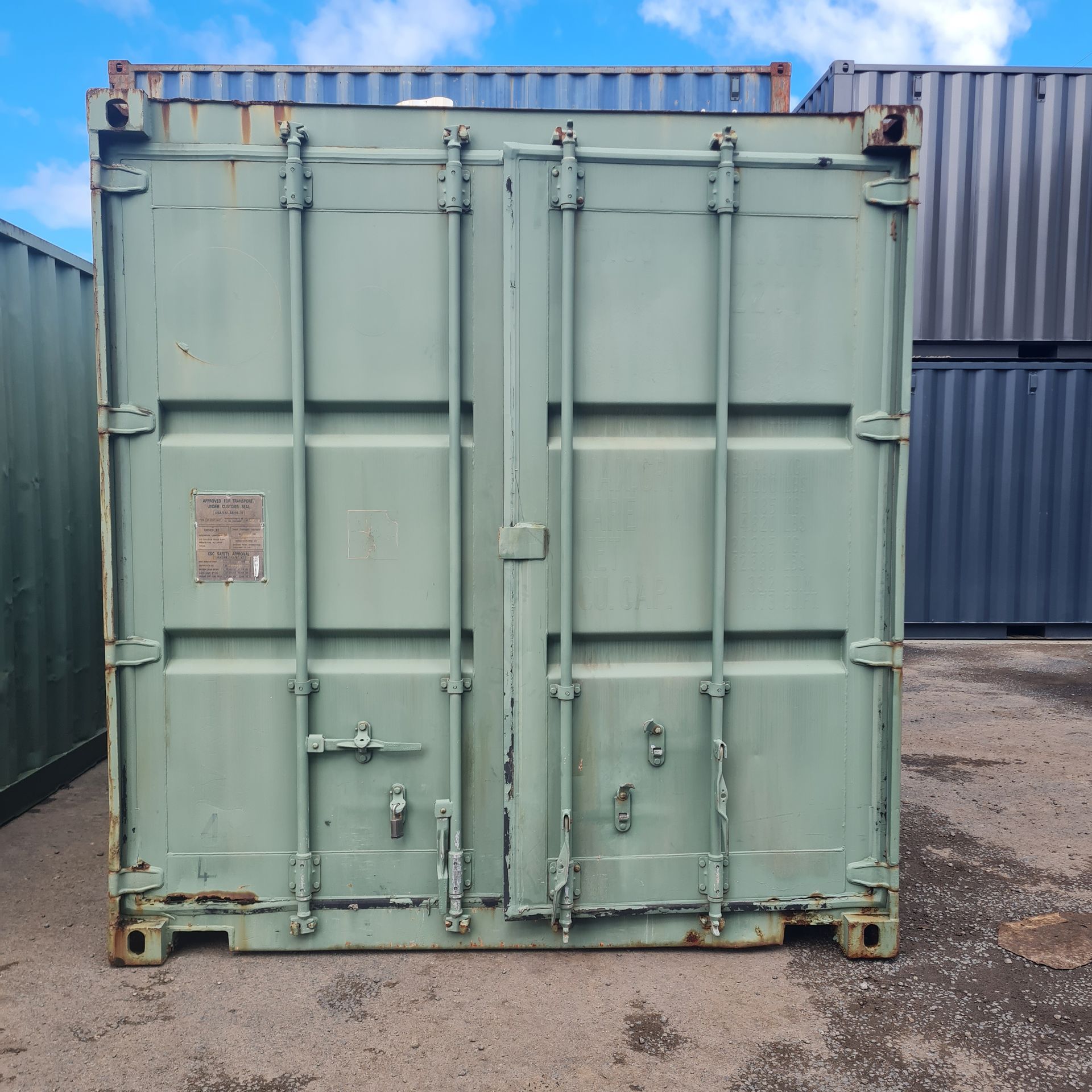 Green Shipping Container With Closed Double Doors — East Coast Containers Shipping Containers and Transport in Chevallum, QLD