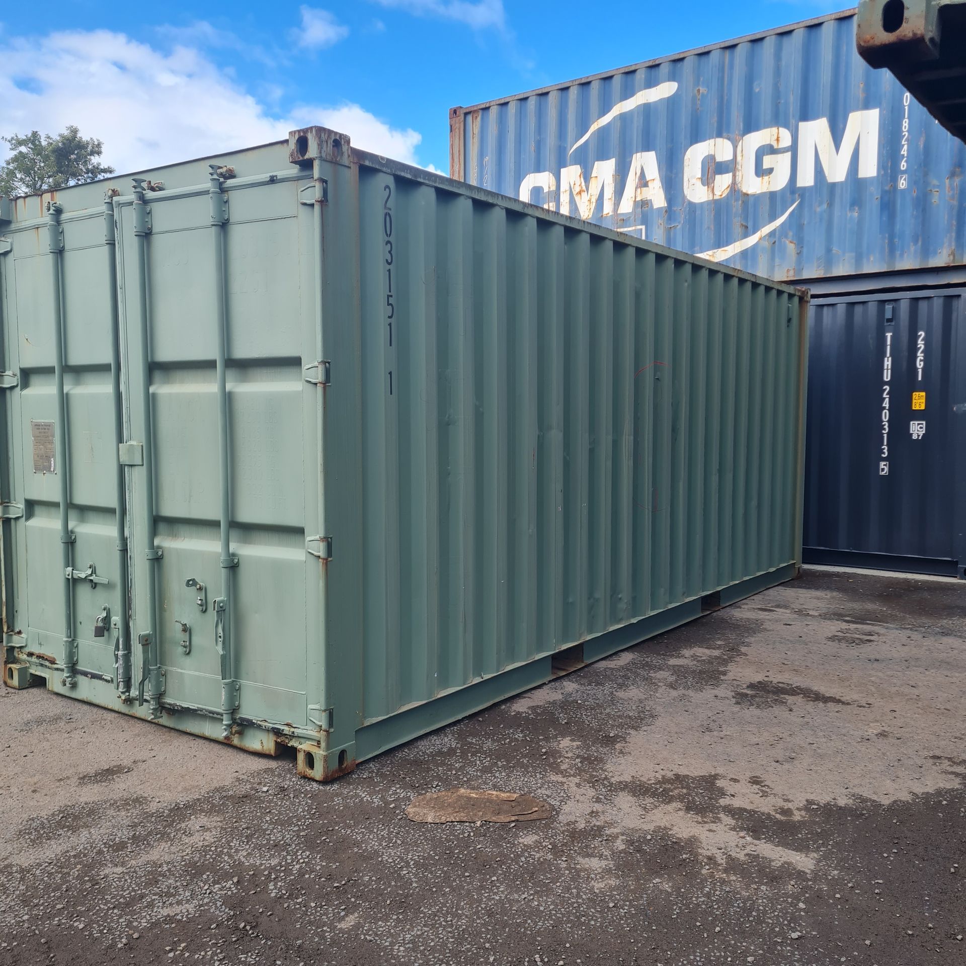 Green Shipping Container With Closed Double Doors — East Coast Containers Shipping Containers and Transport in Chevallum, QLD