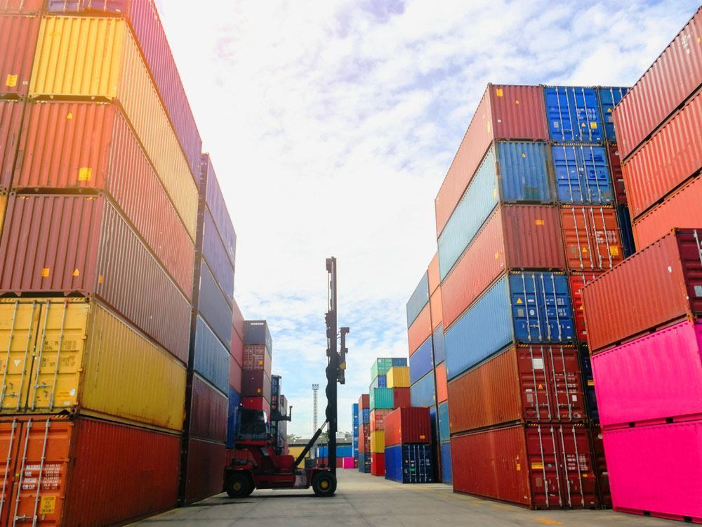 A Reach Stacker Crane Moves Shipping Containers — East Coast Containers Shipping Containers and Transport in Chevallum, QLD