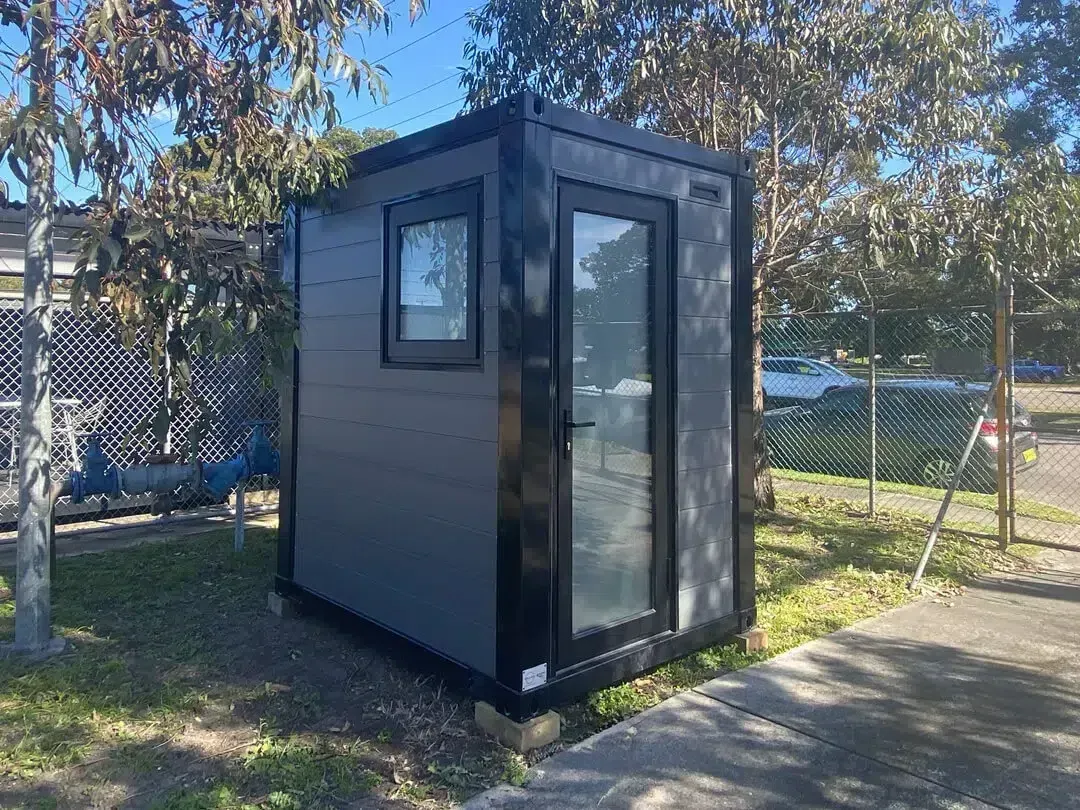 Small Bathroom With Frosted Glass Shower Door — East Coast Containers Shipping Containers and Transport in Chevallum, QLD