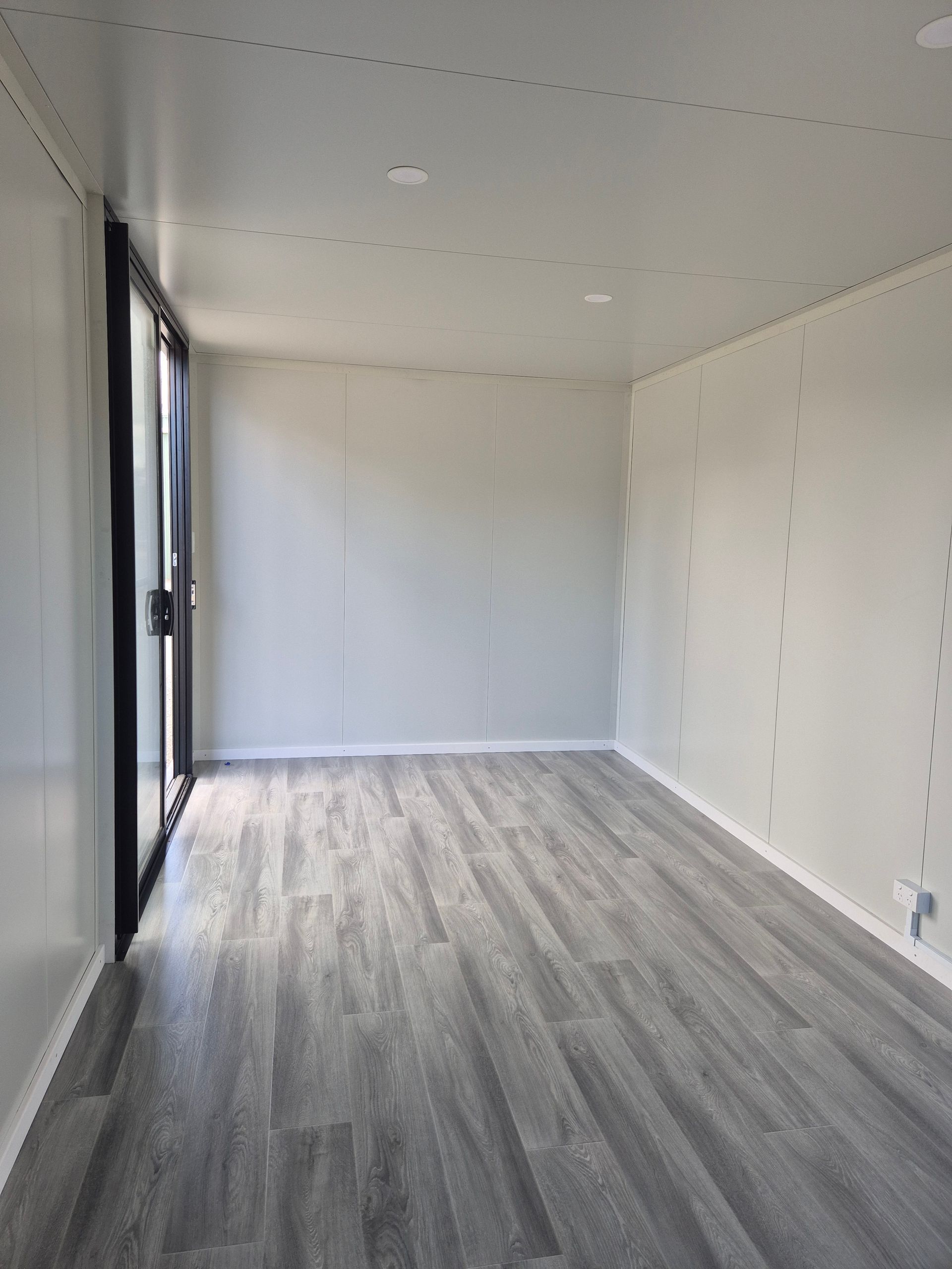 Empty Modern Room With White Walls  — East Coast Containers Shipping Containers and Transport in Chevallum, QLD