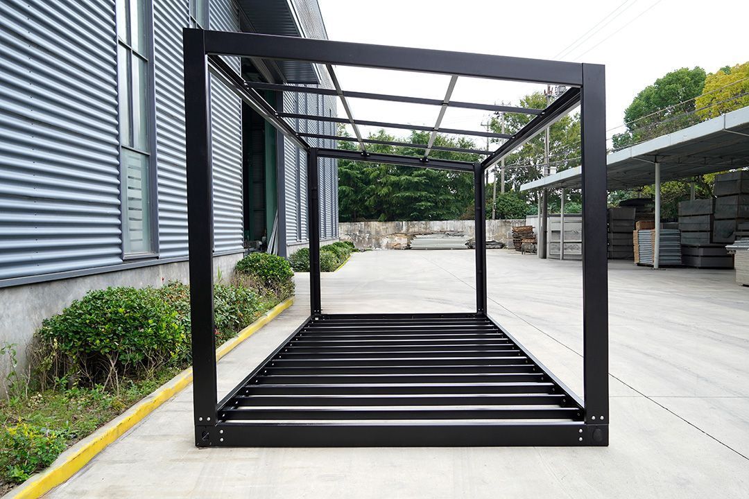 Black Metal Pergola Frame on Concrete — East Coast Containers Shipping Containers and Transport in Chevallum, QLD