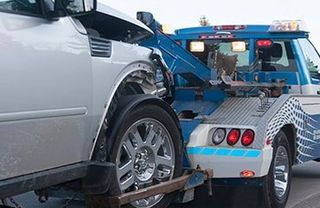 Car Towing — Collision Repair in Gulfport, MS