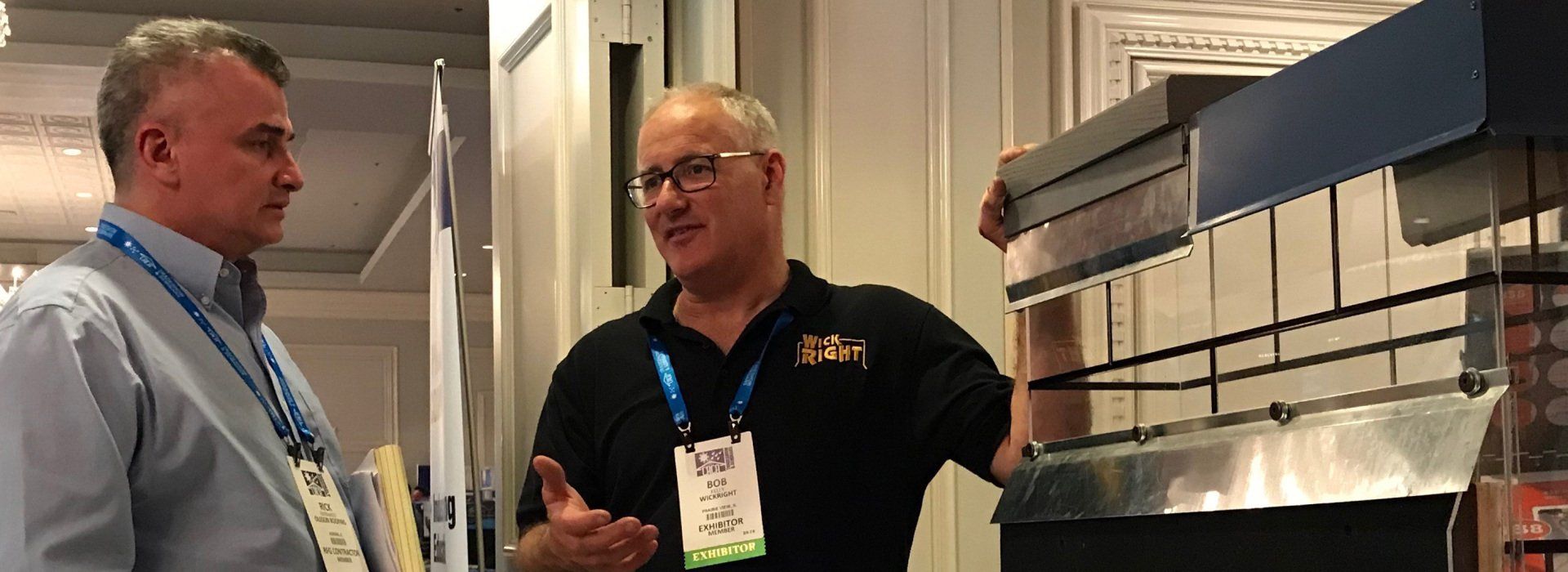 Bob Kelly explaining WickRight at ALA trade show