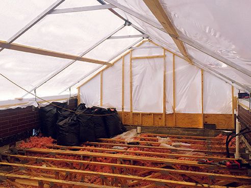 Interior of 365 Construction Tent big enough to store materials and tools