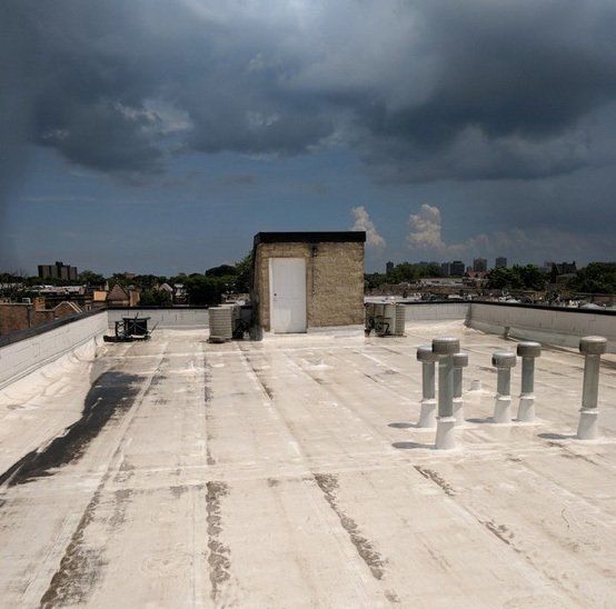 WickRight roof vent installed on roof in Chicago, keeps flat roof systems dry and prevents leaks and  moisture intrusion.