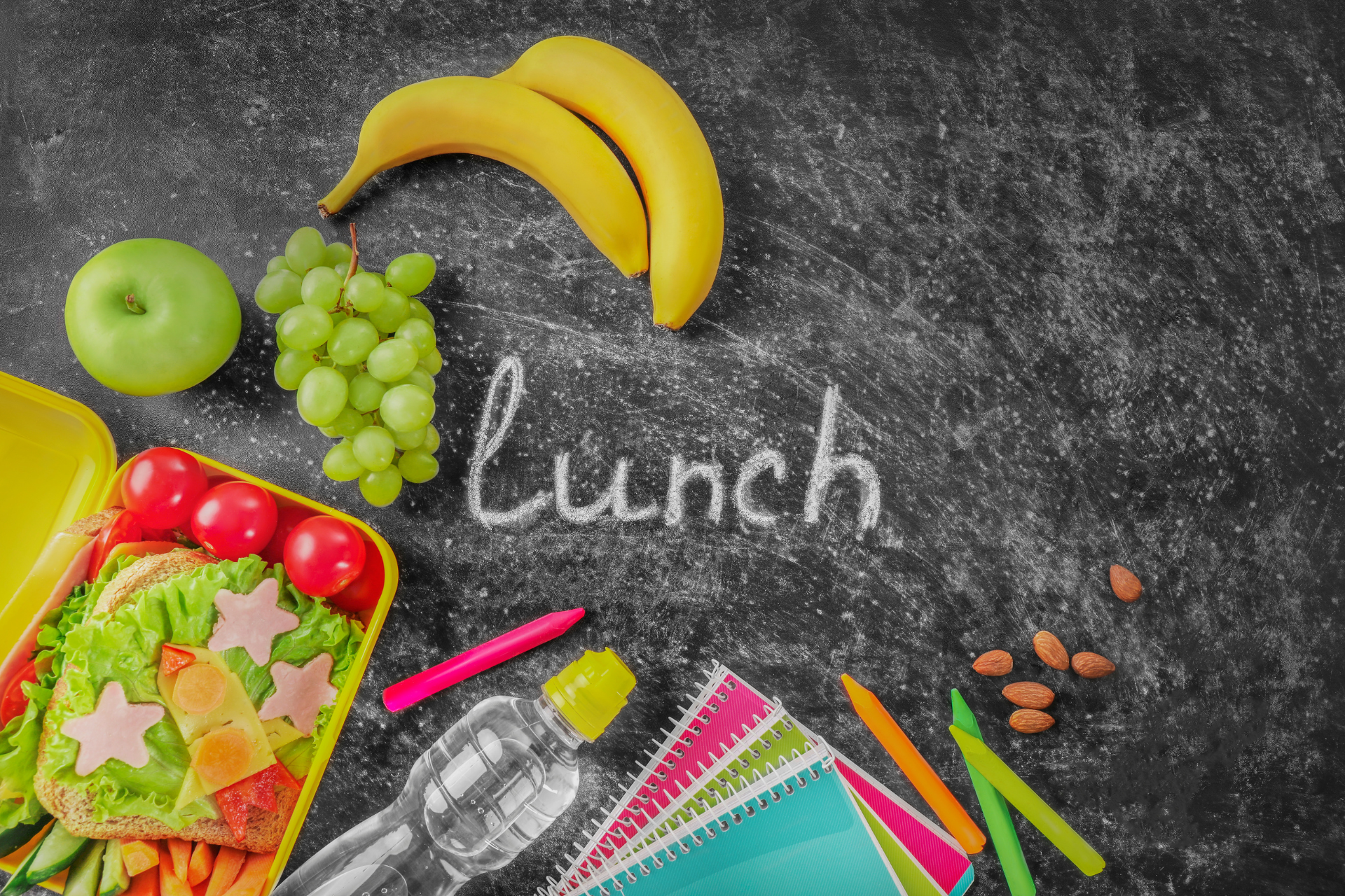 A chalkboard with the word lunch written on it.