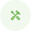 A green cross with a hammer and screwdriver on a white background.
