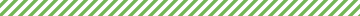 A close up of a green and white striped fabric.