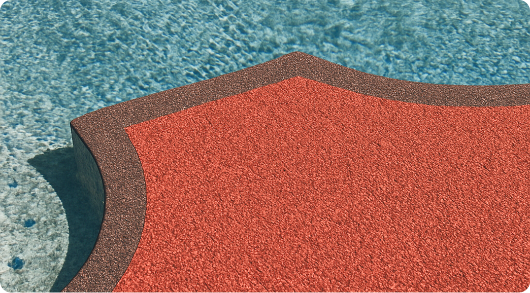 A red towel is sitting on top of a swimming pool.